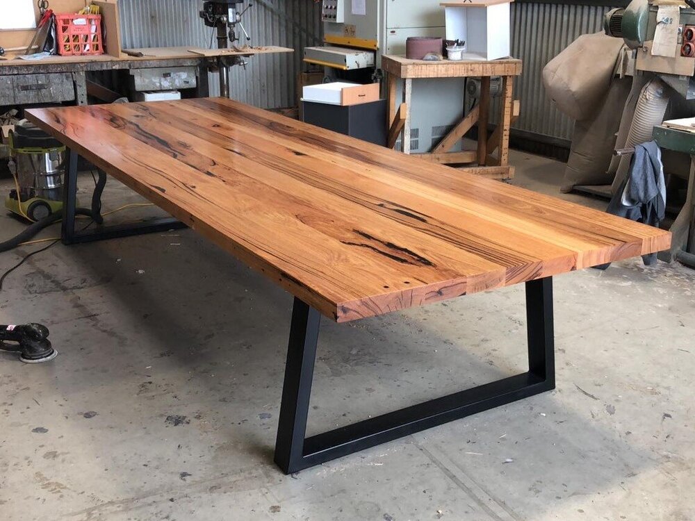 Introducing the Jarosite Solid Timber Black Metal Leg Dining Table